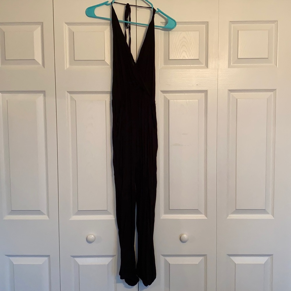 Black halter jumpsuit, open back, pockets, M